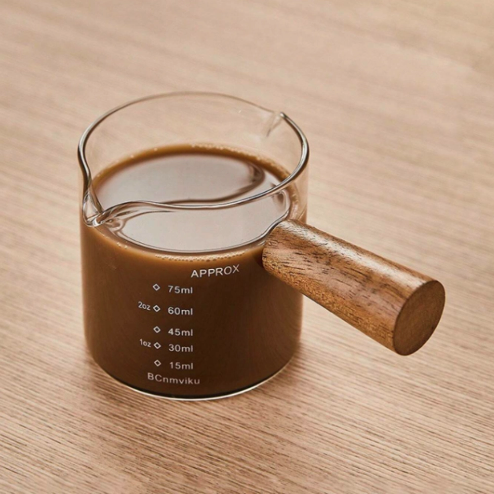Taza medidora de vidrio con graduaciones